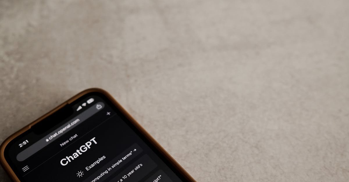 A smartphone displays the ChatGPT interface on its screen, symbolizing modern AI technology.