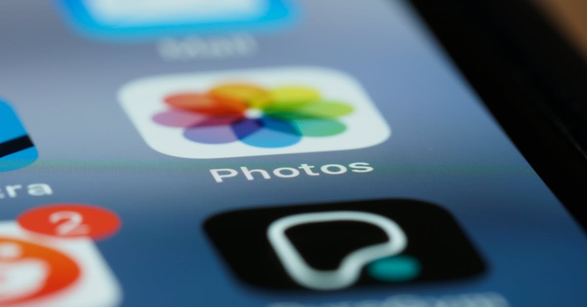 Detailed shot of smartphone screen showing app icons, including photos app.