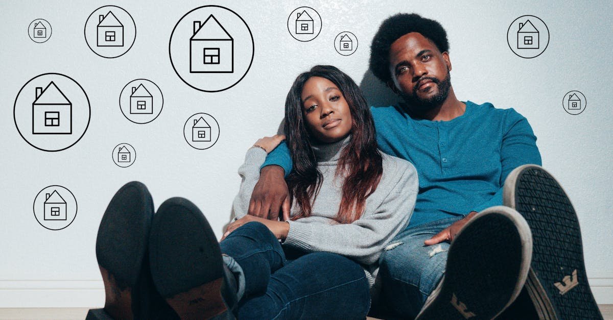 Couple sitting on the floor dreaming about new home ownership surrounded by house icons.